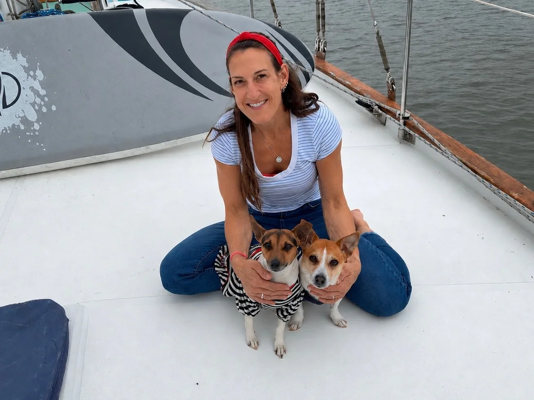 Tara with Toby and Nelly on the foredeck
