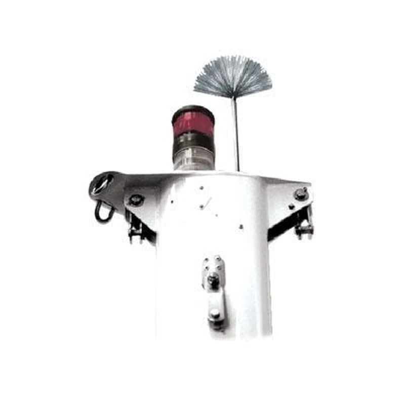 A stainless steel bottle-brush static dissipator on a short rod above a red masthead light on top of a mast