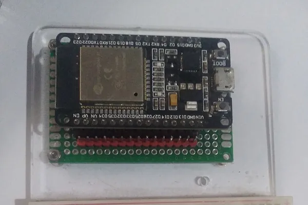 An ESP32 development board on a breadboard